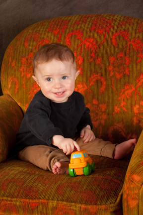 child portrait, child with car, child in chair
